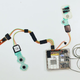 The entire self-lacing electronics system. It includes buttons, lights, motor, pressure sensor, and two cable pulleys. (Image: Mindtribe)